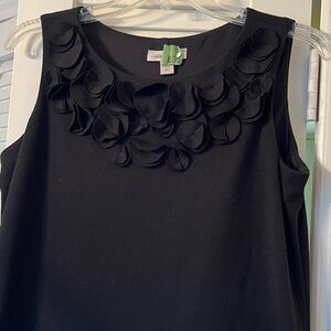 Beautiful sleeveless little black dress with ruffle neckline, fully lined